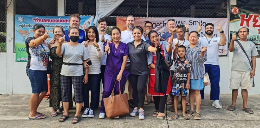 Volunteer team with local community